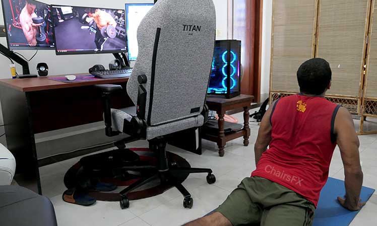 Stretch break while using a gaming chair