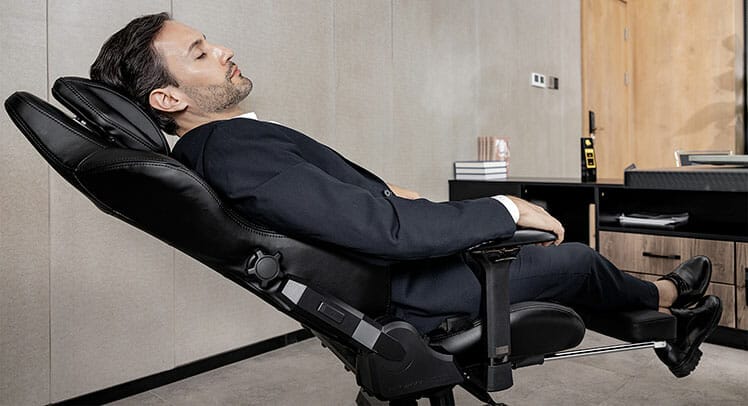 DXRacer Master gaming office chair with retractable footrest