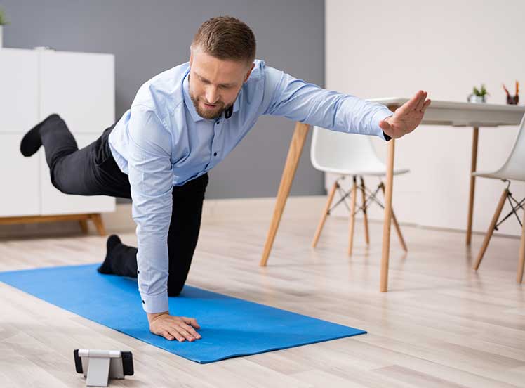 Businessman taking a stretching break