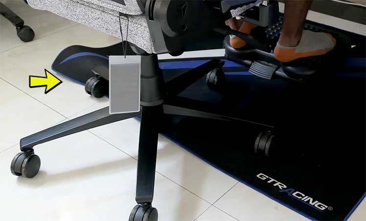 Snagged gaming chair floor mat example
