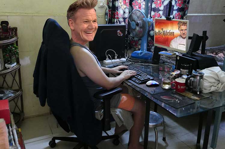 Man using a gaming chair in his private workspace