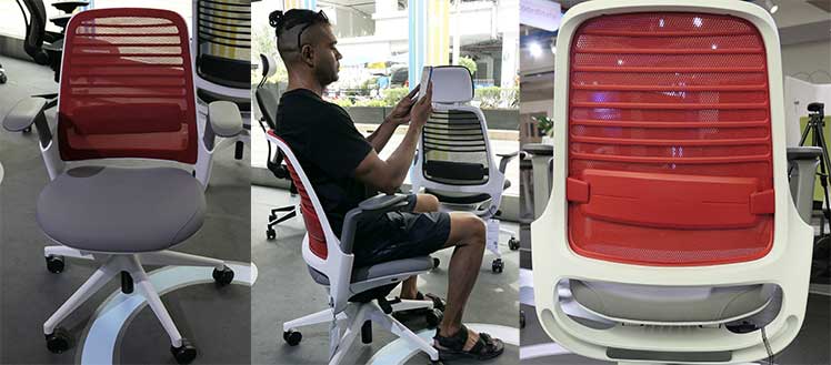 Front, rear, and side views of the Steelcase Series 1 chair with a grey seat and red backrest