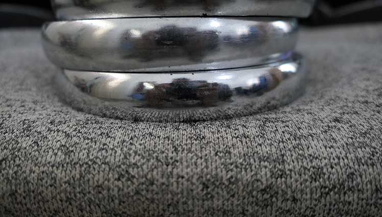 Closeup of Secretlab Titan padding compressed under steel weights