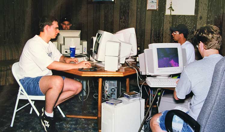 Young people at a video game party in 1999