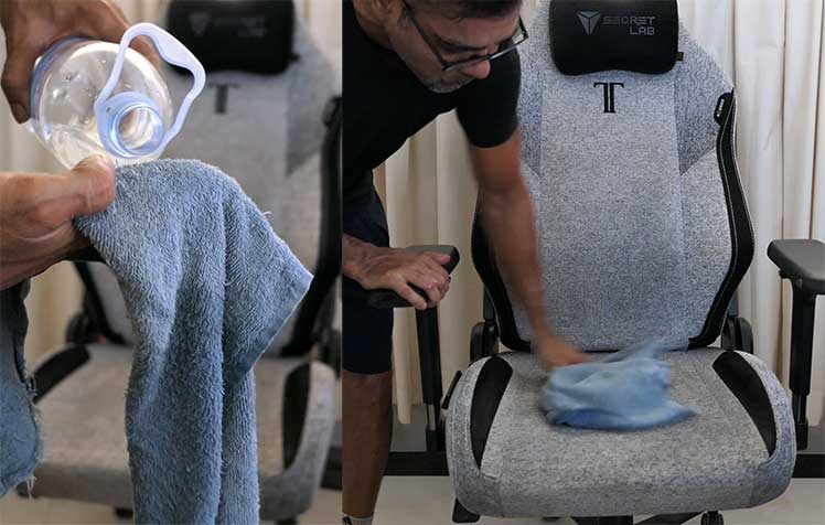 Cleaning up detergent on a chair using a damp rag