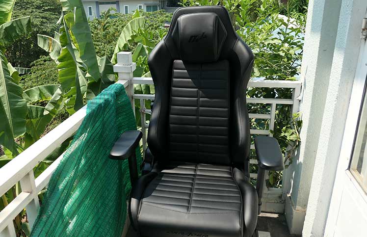 Gaming chair cleaning in direct sunlight