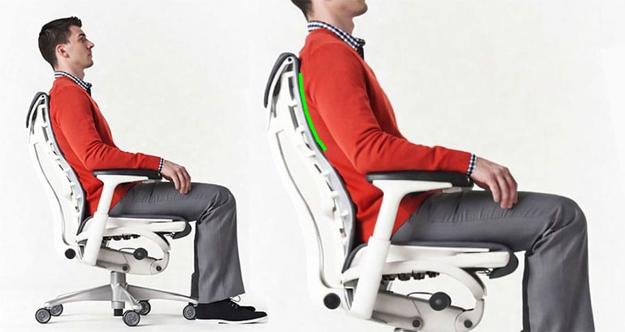 Side-view comparison of a user seated in a Herman Miller Embody chair, highlighting the chair’s upper-back support design that helps keep the torso upright.