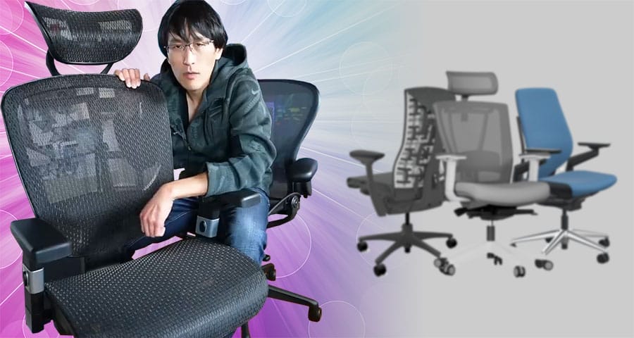 TechLead pictured with an ergonomic office chair, illustrating his decision to use the Staples Hyken as his main programming chair while keeping a Herman Miller Aeron as a backup.