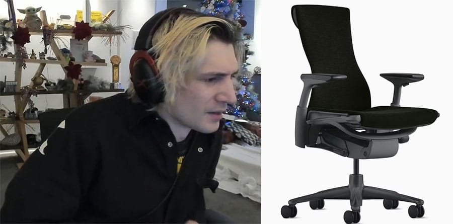 xQc leaning forward while streaming, seated in a Herman Miller Embody ergonomic office chair with curved fabric backrest.